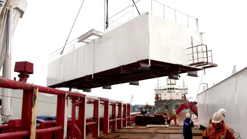 The two survivor units were transported from the workshop to the quay and lifted into position