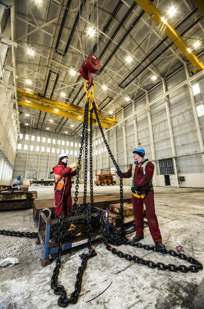 Test weights are deployed during rigorous crane testing before handover to Babcock