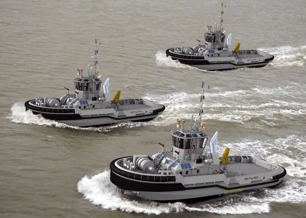 An artists impression depics the trio of Damen ASD 2810 Hybrid tugs ordered for the Royal Netherlands Navy