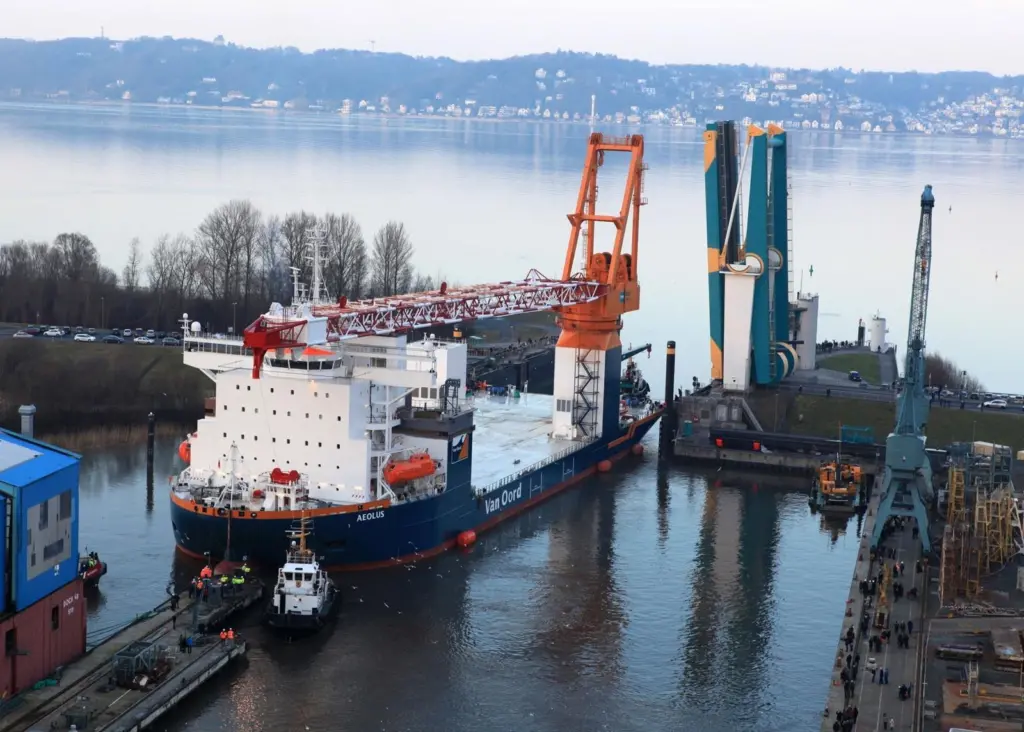 Aeolus, the first jack-up vessel built in Germany for offshore wind farms, glides onto the Elbe