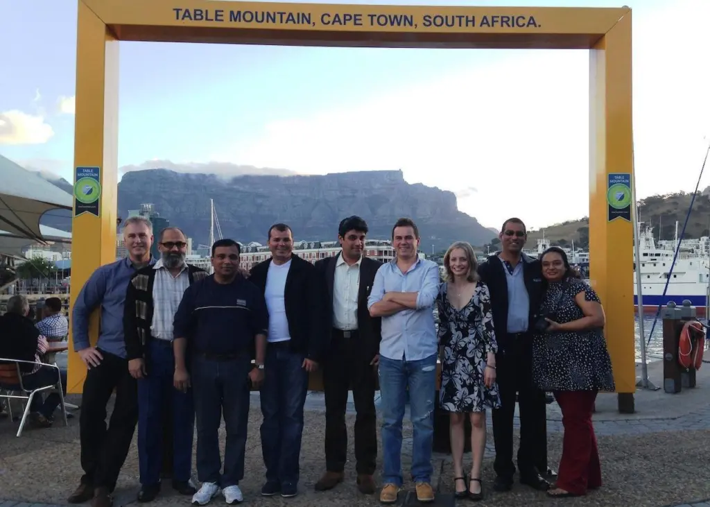Participants at Tideland Signal’s conference in Cape Town gather foe a view of Table Mountain