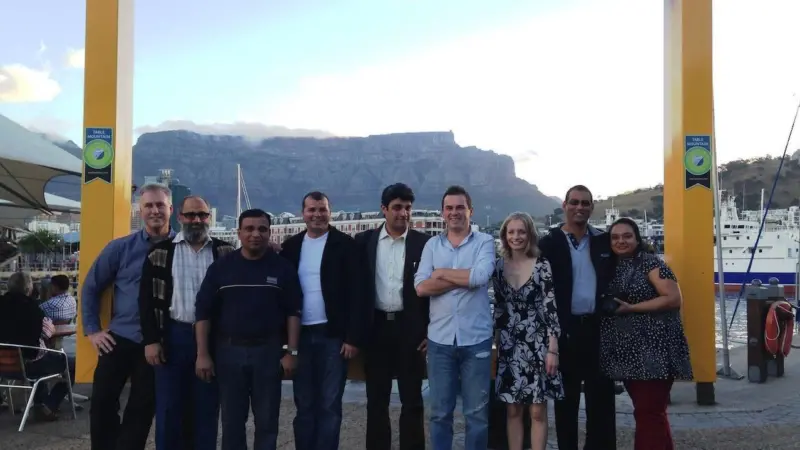 Participants at Tideland Signal’s conference in Cape Town gather foe a view of Table Mountain