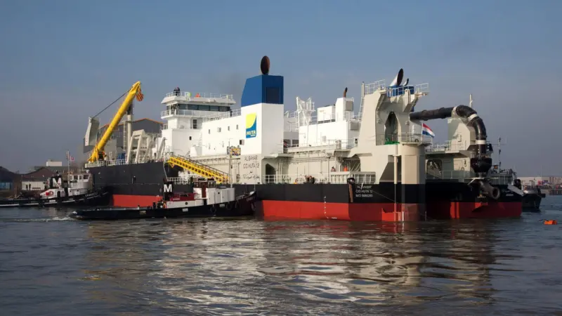 Support vessels take control of the newbuild following its launch at Kinderdijk