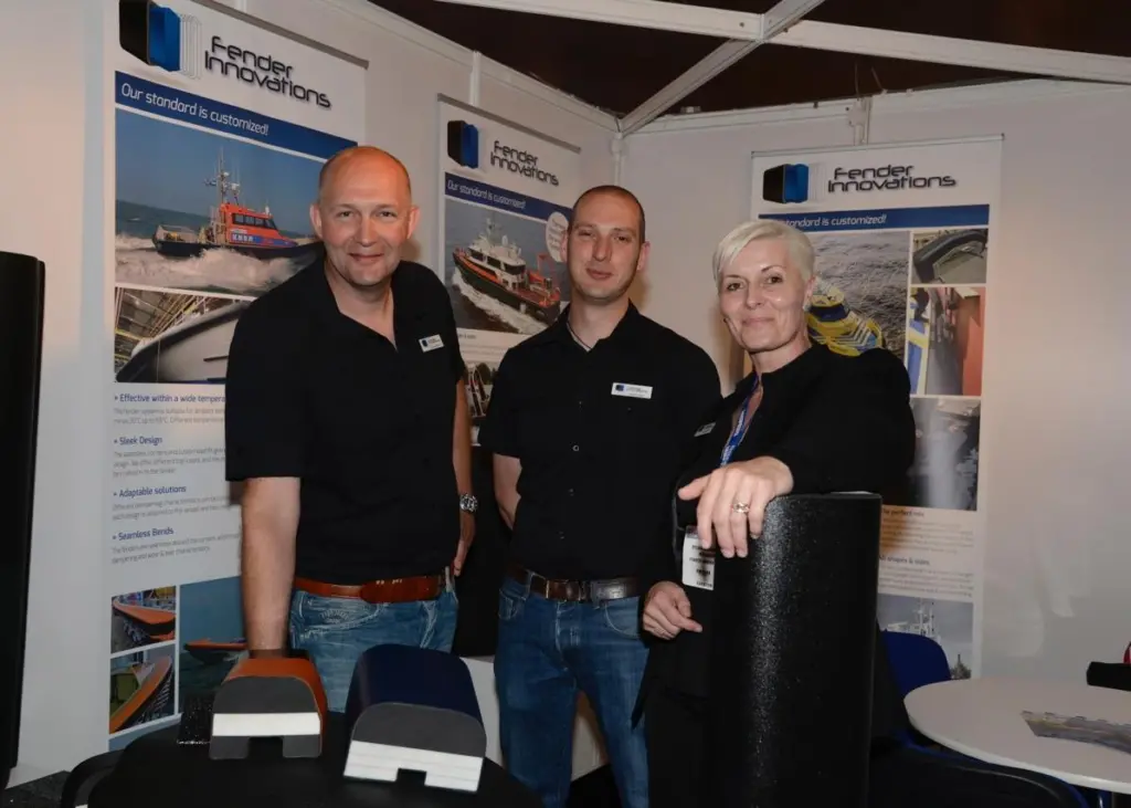 Fender Innovations stand personnel celebrate