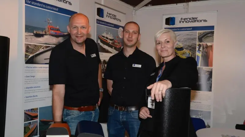 Fender Innovations stand personnel celebrate