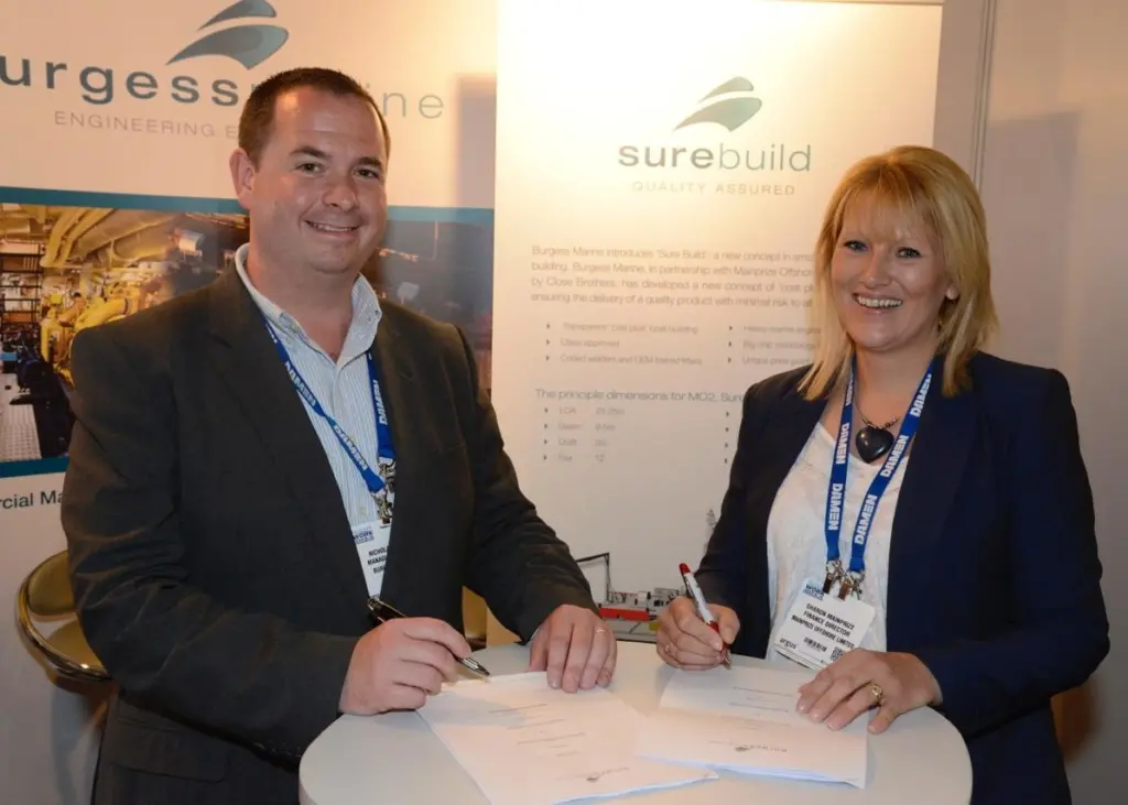 Nicholas Warren of Burgess Marine and Sharon Mainprize seal the deal at Seawork