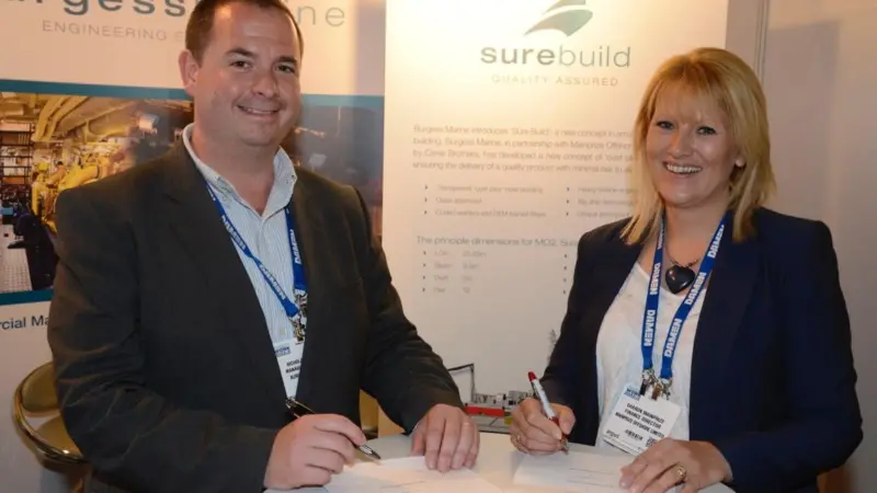 Nicholas Warren of Burgess Marine and Sharon Mainprize seal the deal at Seawork