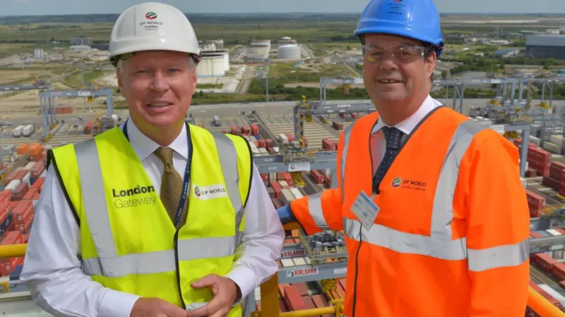 Simon Moore and Stephen Hammond MP look out over the busy port