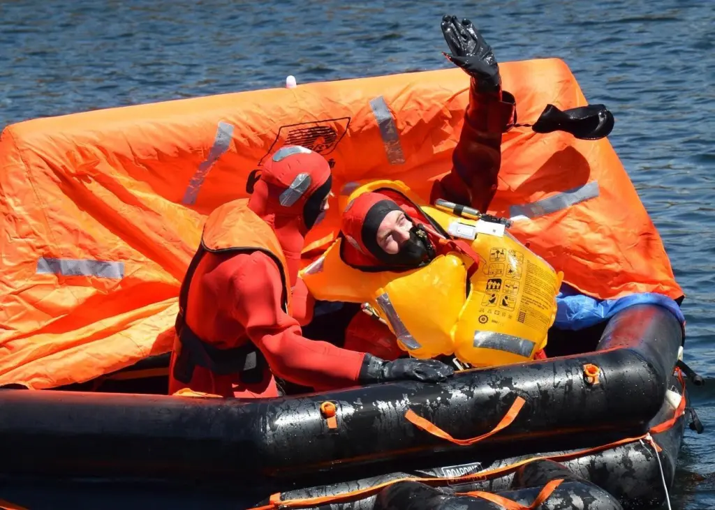ISP staff demonstrate a Duarry Challenger liferaft in Liverpool's Albert Dock