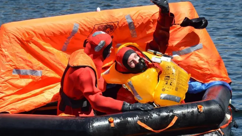 ISP staff demonstrate a Duarry Challenger liferaft in Liverpool's Albert Dock