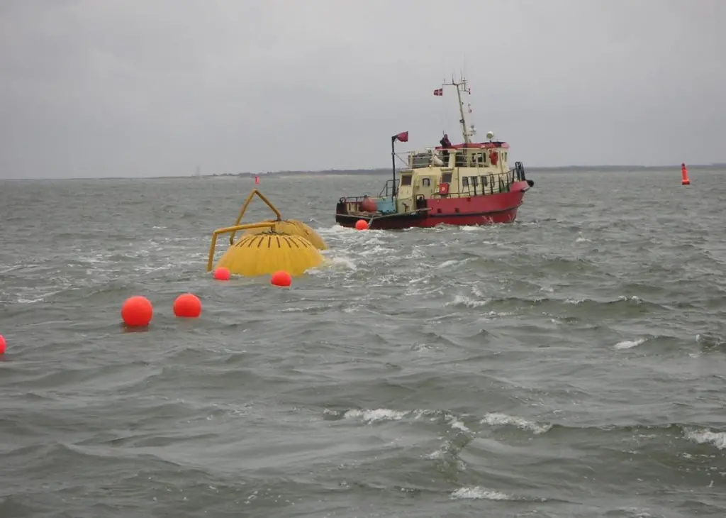'Diver Master' being slowly towed back into the Port of Esbjerg
