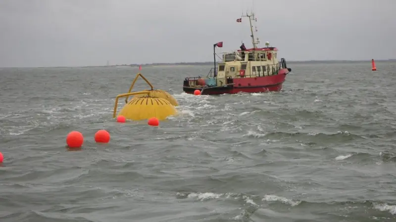 'Diver Master' being slowly towed back into the Port of Esbjerg
