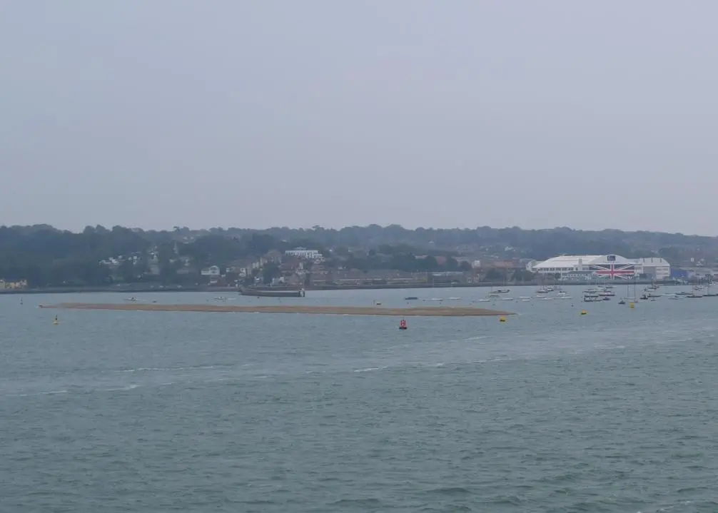When completed, the breakwater will be a 350m long, detached rock armoured breakwater that protects existing homes, businesses and harbour users Photo: Flickr/CHC