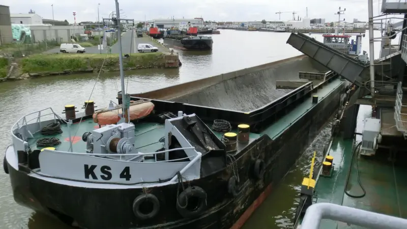 One of the existing hopper barges in operation at Bremenports