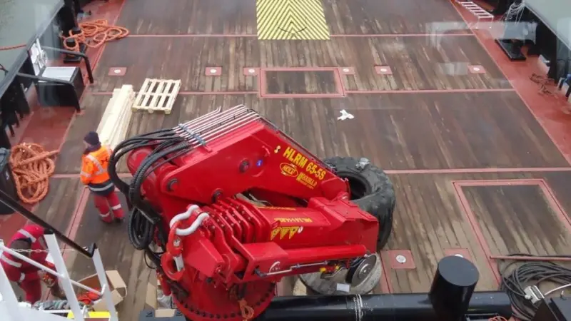 Maximum deck load is 50 tonnes and there are 3x20ft container bays