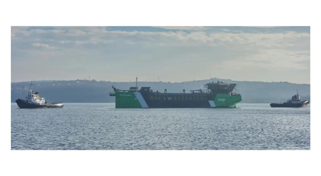 Tugs control the vessel following its launch last month
