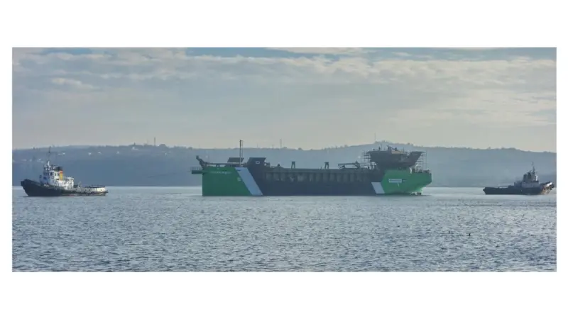 Tugs control the vessel following its launch last month