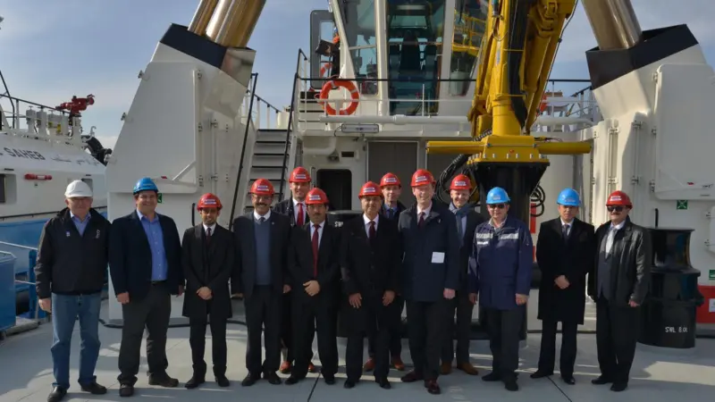 Guests line up for a photo-call at the naming of 'KOC Shahem' (Damen)