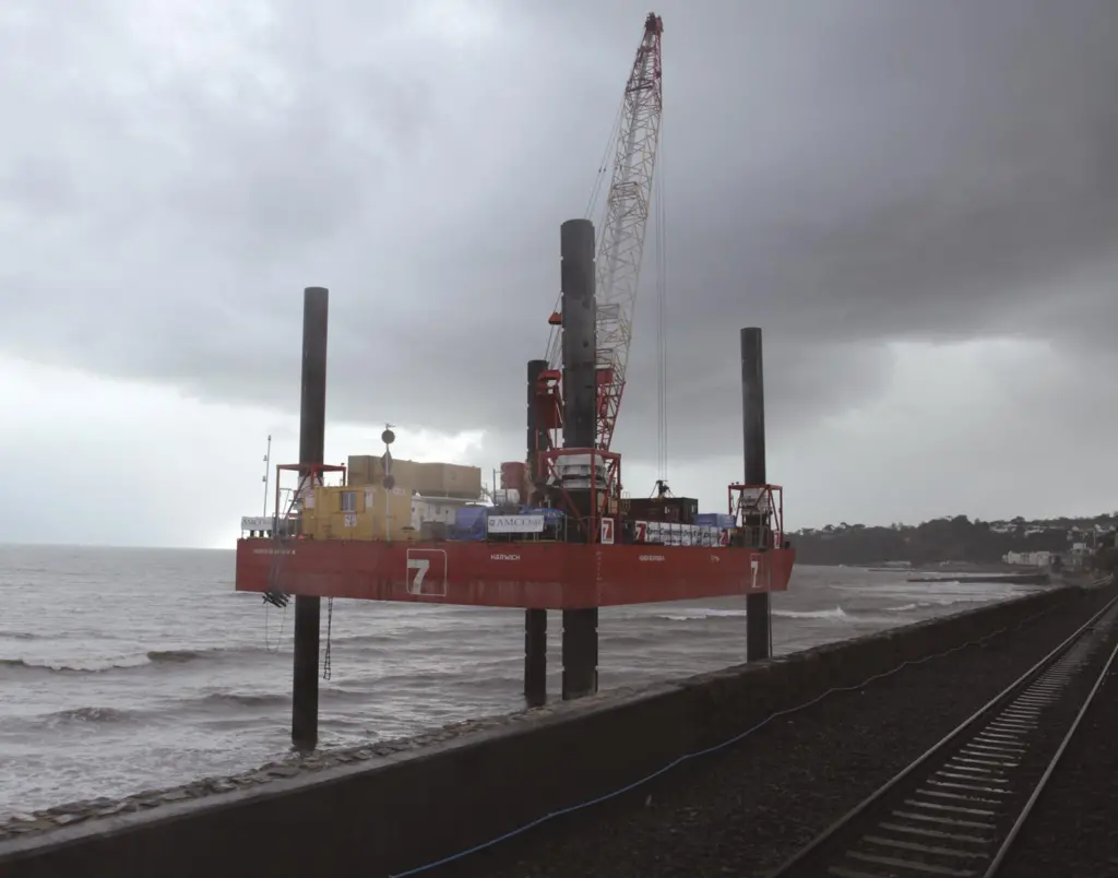 Red7Marine's Seariser 4 on the beach beside the main railway line