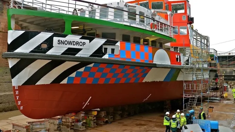 The Mersey ferry 'Snowdrop' receives her distinctive new coat of paint in Laird's dry dock