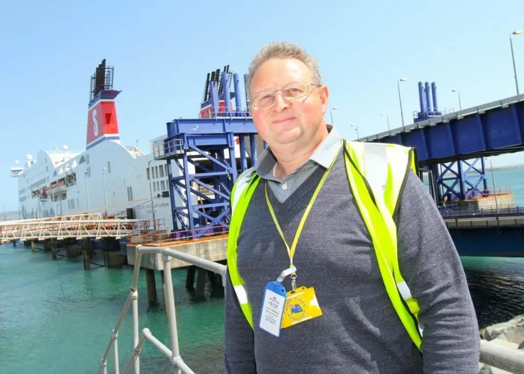 Cliff Grainger of MPE interiors in front of one of the refurbished ferries