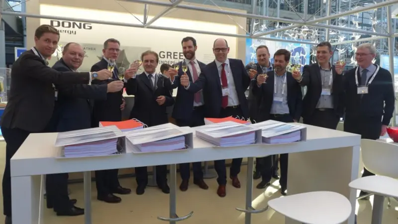 The agreement between Jan De Nul Group and Dong Energy was officially signed at Dong Energy's exhibition stand at EWEA 2015