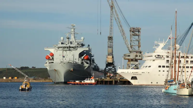 Pilot launch Arrow escorts a small cruise ship outbound past the RFA Argus. Photo (c) G Ewens