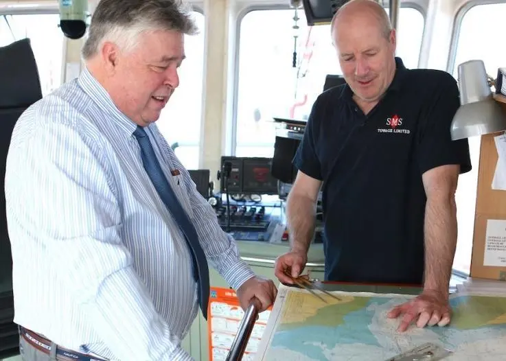 SMS Towage’s Captain John Pinder, right, with Hugh Patience, SMS’s marine manager and assessor