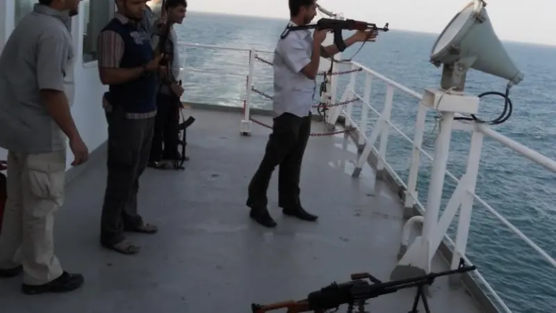 An armed private security operative in the Indian Ocean (Photo: Wikipedia commons)