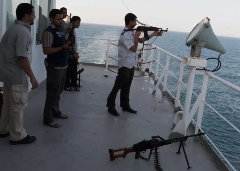 An armed private security operative in the Indian Ocean (Photo: Wikipedia commons)