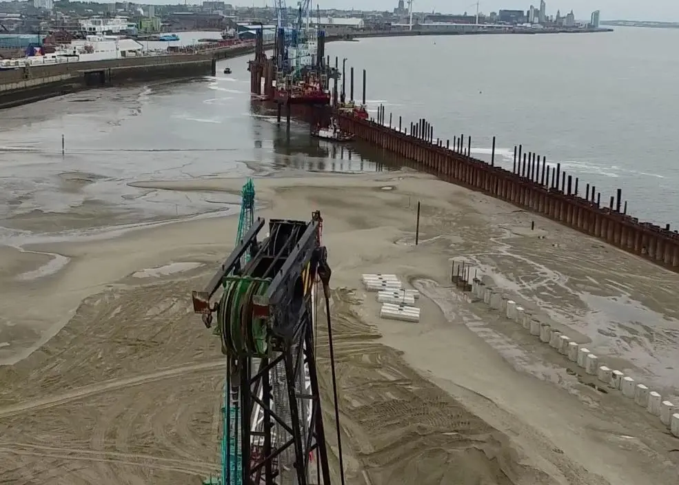 The piling process involves drilling from large jack-up rigs and inserting tubular piles to create a new 854m long quay wall