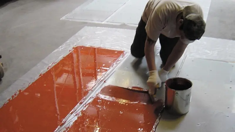 Application of the Sikafloor® Marine PU-Red flooring system.