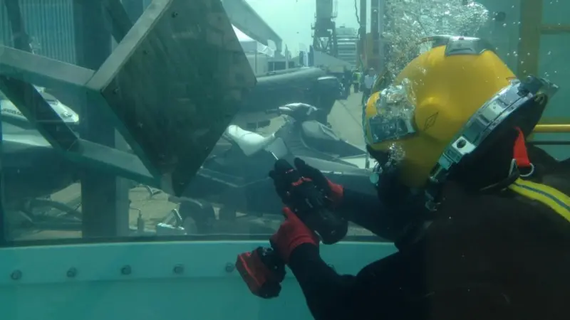 The drill was demonstrated in the dive tank on the quayside at Seawork