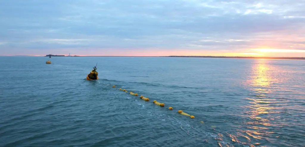 When deployed, the device causes minimal obstruction to surface vessels