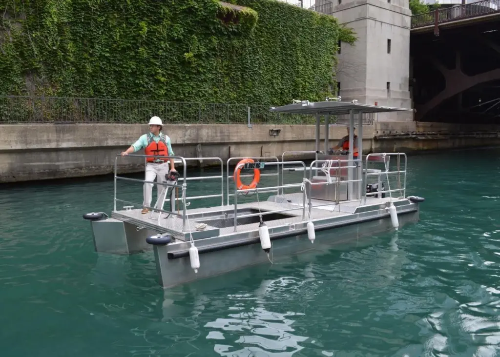 Elastec and MWRD worked together to develop two custom trash and debris collection boats
