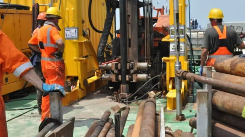 Wireline downhole CPT (tool shown emerging from the mousehole in the deck to the right of the photograph) can test highly variable ground more effectively and faster than top-push systems at depths greater than 30m below the seabed