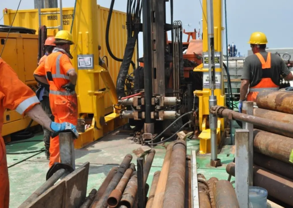 Wireline downhole CPT (tool shown emerging from the mousehole in the deck to the right of the photograph) can test highly variable ground more effectively and faster than top-push systems at depths greater than 30m below the seabed