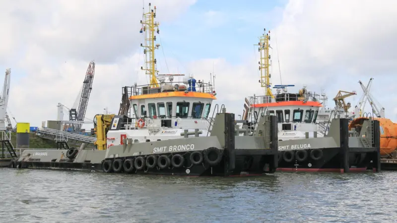 Two of the B-Class tugs pictured in Rotterdam wearing their previous Smit clothing (Peter Barker)