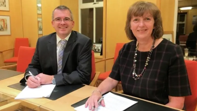 The contract signing, with Sandra Laurenson, Chief Executive, Lerwick Port Authority, and James Woodward, Area Sales Manager, Transas