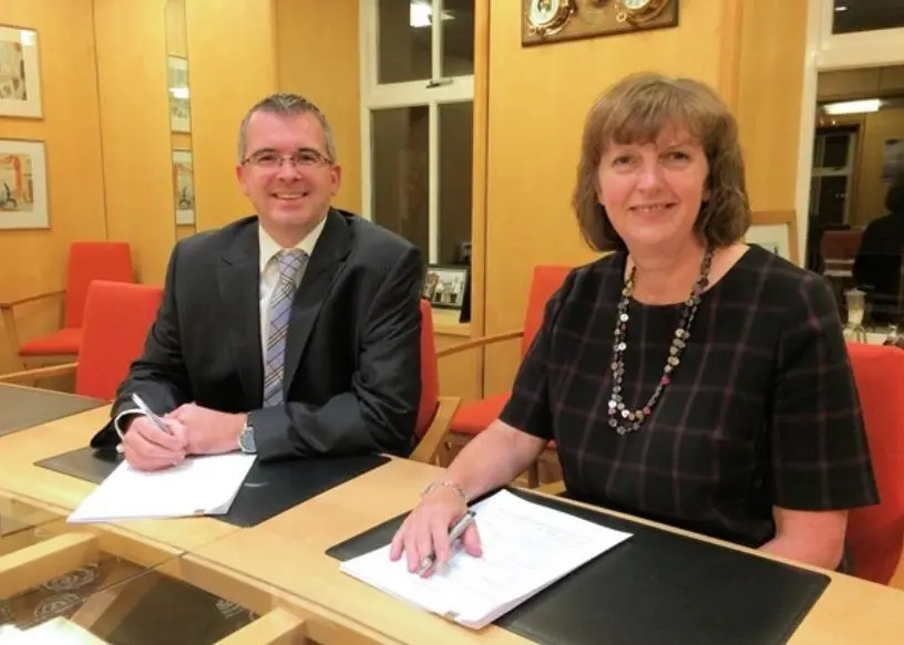 The contract signing, with Sandra Laurenson, Chief Executive, Lerwick Port Authority, and James Woodward, Area Sales Manager, Transas