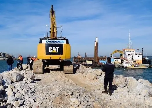 Breakwater construction relies upon accurate block positioning (Photo:Poole Harbour Commissioners)