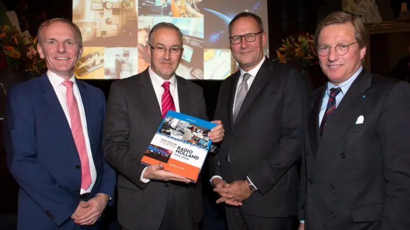 The Mayor was presented with the first edition of ‘A century Radio Holland, 1916-2016’