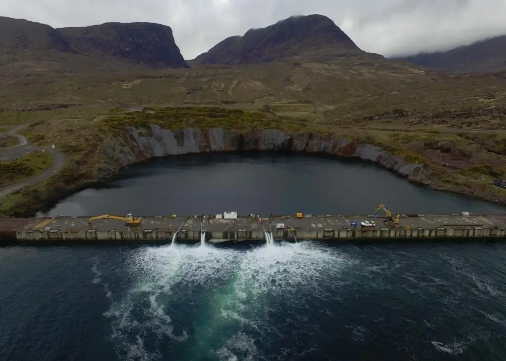 Pumping out of the dry dock at Kishorn has commenced