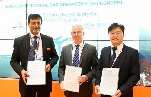 Representatives from Wartsila, CHI and Lloyd's Register sign the concept approval (Wartsila)