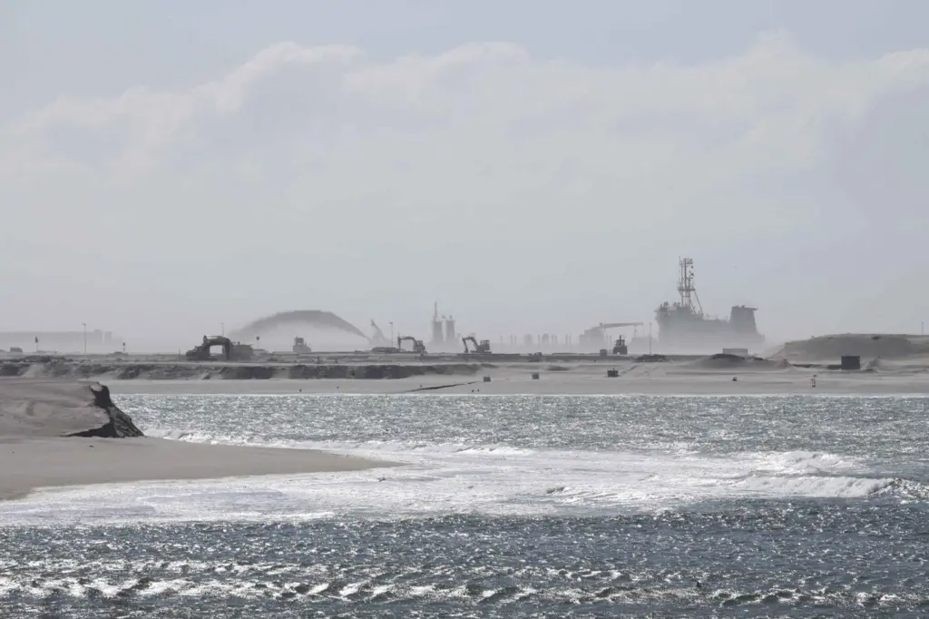 Over time dredgers and plant have won new land from the sea (Peter Barker)
