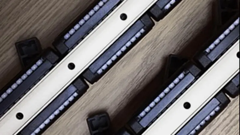 Photo of (unfitted) tracks showing the bearings that help the loads glide