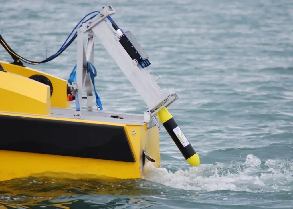 AUVs were launched autonomously from three launch tubes mounted on the stern of an ASV C-Worker-5