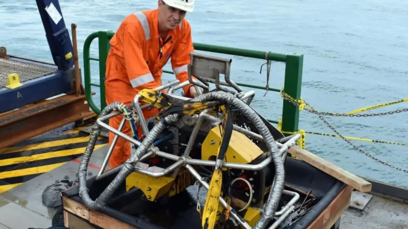 A Moskito being prepared on deck of the 'Surf Allamanda'