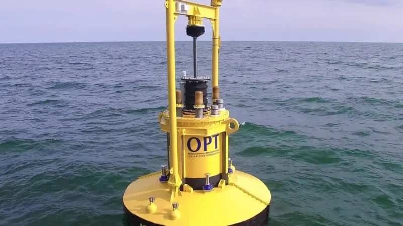 The buoy supports an extended heave plate to control the buoy motions and inside the buoy is a float that moves up and down with the wave motion