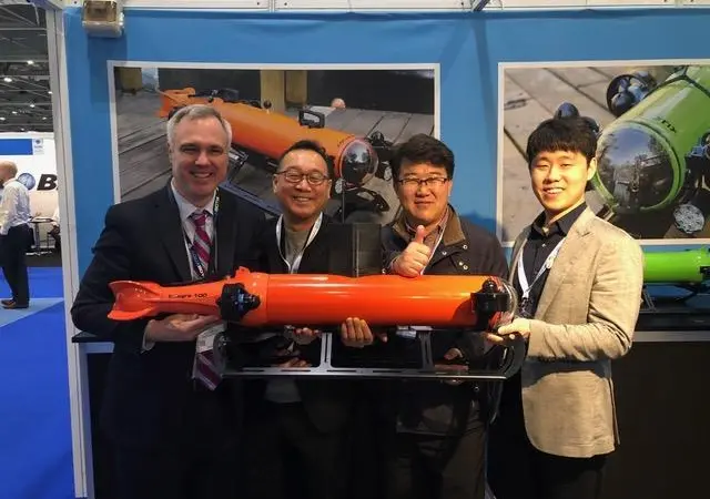 The KIGAM team with Ted Curley, holding their new Integra AUV-ROV